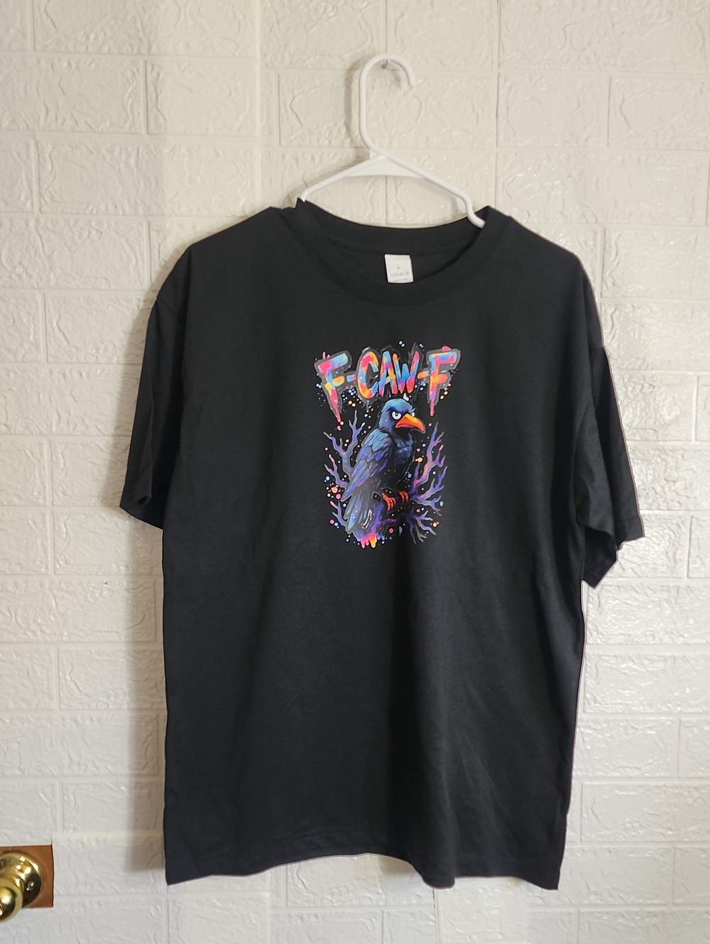 Black Short-Sleeve Graphic Tee with Colorful Crow Illustration